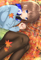 Rule 34 | 1girl, absurdres, autumn leaves, black pantyhose, blue cardigan, blue eyes, blush, brown hair, cardigan, commentary, feet out of frame, go-toubun no hanayome, green skirt, headphones, headphones around neck, highres, leaf, long hair, long sleeves, looking at viewer, lying, nail polish, nakano miku, on side, open mouth, pantyhose, pink nails, pleated skirt, rain sunny, skirt, smile, solo, sunlight, teeth, upper teeth only