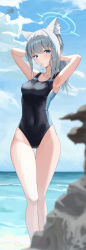 Rule 34 | 1girl, absurdres, animal ear fluff, animal ears, arms behind head, beach, black one-piece swimsuit, blue archive, blue eyes, blue sky, blurry, breasts, cloud, competition swimsuit, covered navel, cross hair ornament, day, depth of field, extra ears, feet out of frame, grey hair, hair ornament, halo, highres, horizon, low ponytail, lows., medium breasts, medium hair, mismatched pupils, multicolored clothes, multicolored swimsuit, ocean, one-piece swimsuit, outdoors, rock, shiroko (blue archive), shiroko (swimsuit) (blue archive), sky, solo, standing, swimsuit, tying hair
