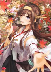 Rule 34 | 1girl, ahoge, autumn leaves, bare shoulders, blurry, blurry background, blurry foreground, blush, breasts, brown hair, day, depth of field, detached sleeves, double bun, hair bun, hairband, headgear, highres, holding, holding leaf, japanese clothes, kantai collection, kongou (kancolle), kongou kai ni (kancolle), konkito, leaf, long hair, looking at viewer, medium breasts, multiple girls, nontraditional miko, open mouth, outdoors, purple eyes, reaching, reaching towards viewer, skirt, smile