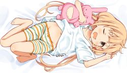Rule 34 | 1girl, bed sheet, blonde hair, brown eyes, collarbone, commentary request, futaba anzu, holding, holding stuffed toy, idolmaster, idolmaster cinderella girls, long hair, looking at viewer, low twintails, lying, mirakichi, on back, one eye closed, open mouth, short sleeves, shorts, solo, striped clothes, striped shorts, stuffed animal, stuffed rabbit, stuffed toy, twintails, yawning