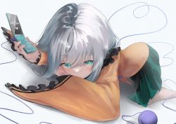 Rule 34 | 1girl, absurdres, aqua eyes, cable, cellphone, covered mouth, digital media player, earbuds, earphones, face, flip phone, green skirt, heart, heart of string, highres, holding, holding phone, komeiji koishi, l neconeco l, long sleeves, looking at viewer, lying, phone, skirt, smartphone, solo, touhou