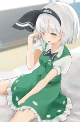 Rule 34 | 1girl, 258n, absurdres, bed, black bow, black bowtie, blue eyes, blurry, blurry background, blush, bow, bowtie, breasts, buttons, collar, collared shirt, dress, ghost print, green dress, grey hairband, hairband, hand up, highres, hitodama print, konpaku youmu, looking at viewer, medium breasts, one eye closed, open mouth, puffy short sleeves, puffy sleeves, shirt, short hair, short sleeves, silver hair, sitting, solo, touhou, white shirt