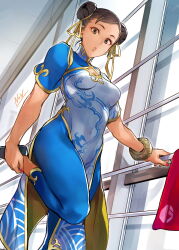 Rule 34 | 1girl, absurdres, black hair, blue dress, bracelet, breasts, capcom, china dress, chinese clothes, chun-li, cleavage cutout, clothing cutout, covered navel, dress, hair bun, highres, holding, jewelry, kujou non, looking at viewer, looking down, makeup, medium breasts, nail polish, official alternate costume, open mouth, solo, street fighter, street fighter 6, stretching, surprised, sweat, thighs