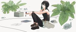 Rule 34 | 1girl, bare arms, bare shoulders, bird, black hair, black pants, black tank top, book, boots, brown footwear, closed mouth, clothes around waist, collarbone, commentary request, english text, full body, green eyes, hands on own knee, hands on own knees, highres, holding, holding pen, looking at viewer, medium hair, mouth hold, no socks, northkiyou, on ground, original, pants, pen, plant, ponytail, rubber band, satellite phone, short ponytail, sidelocks, signature, sitting, solo, tank top, watch, wristband, wristwatch