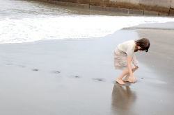Rule 34 | 1girl, asian, barefoot, beach, brown hair, dress, kipi-san, ocean, outdoors, photo (medium), sand, skirt, solo, wet