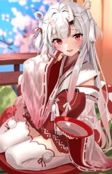 Rule 34 | 1girl, :d, alcohol, blue sky, blurry, blurry background, blush, cherry blossoms, colored tips, cup, day, highres, holding, holding cup, hololive, horns, long hair, long sleeves, looking at viewer, multicolored hair, nakiri ayame, nakiri ayame (shrine maiden), nontraditional miko, open mouth, pink hair, pom pom (clothes), red eyes, red hair, ribbon-trimmed sleeves, ribbon trim, sakazuki, sake, sitting, skin-covered horns, sky, sleeves past wrists, smile, solo, streaked hair, thighhighs, uuroncha, virtual youtuber, wariza, white hair, white thighhighs, wide sleeves, yagasuri, zettai ryouiki