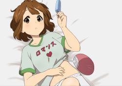 Rule 34 | 1girl, brown eyes, brown hair, commentary request, food, from above, grey shirt, hand fan, hand on own stomach, hand up, heart, highres, hirasawa yui, holding, holding food, k-on!, kicchi (tmgk), looking at viewer, lying, midriff peek, on back, on bed, parted lips, popsicle, shirt, short hair, short sleeves, shorts, solo, t-shirt, teeth, translated, upper body, white shorts