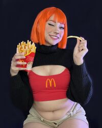 Rule 34 | 1girl, black background, breasts, brown eyes, cleavage, cosplay, female focus, food, french fries, highres, looking at viewer, mcdonald&#039;s, mexican (nationality), mother (yoru mac), mother (yoru mac) (cosplay), navel, one eye closed, orange hair, photo (medium), short hair, simple background, sitting, small breasts, smile, solo, taliverse, teeth
