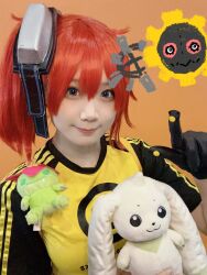 Rule 34 | 1girl, aiba ami, aiba ami (cosplay), cosplay, digimon, digimon story: cyber sleuth, gloves, hagurumon, highres, looking at viewer, palmon, photo (medium), real life, red hair, smile, terriermon