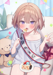 Rule 34 | 1girl, :o, birthday sash, blush, box, brown hair, cake, collarbone, commentary request, confetti, couch, curtains, ebihara beniko, fang, food, fork, gift, gift box, hair between eyes, hands up, heart-shaped box, highres, holding, holding fork, indoors, long sleeves, looking at viewer, off shoulder, on couch, open mouth, original, pennant, pillow, plant, plate, purple eyes, shirt, sitting, solo, string of flags, stuffed animal, stuffed cat, stuffed toy, translated, v, white shirt