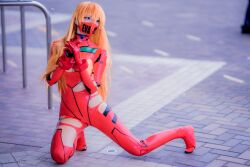 Rule 34 | 1girl, absurdres, asian, blue eyes, bodysuit, breasts, brown hair, cosplay, evangelion: 3.0+1.0 thrice upon a time, full body, hair down, highres, japanese (nationality), kneeling, long hair, long sleeves, looking to the side, mask, medium breasts, mouth mask, multicolored bodysuit, multicolored clothes, neo.omochi, neon genesis evangelion, photo (medium), pilot suit, plugsuit, rebuild of evangelion, red bodysuit, shiny clothes, smile, souryuu asuka langley, souryuu asuka langley (cosplay), standing, torn bodysuit, torn clothes, very long hair