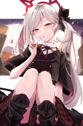 Rule 34 | 1girl, absurdres, black footwear, black scrunchie, black shirt, blue archive, blush, boots, candy, feet out of frame, food, grey hair, hair ornament, hair scrunchie, halo, highres, holding, holding candy, holding food, knee boots, long hair, looking at viewer, mutsuki (blue archive), ninoude (ninoude44), parted lips, plaid, plaid skirt, pointy ears, purple eyes, red halo, red skirt, scrunchie, shirt, short sleeves, skirt, solo