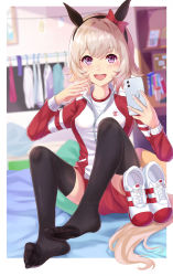 Rule 34 | 1girl, animal ears, black thighhighs, blurry, blurry background, cellphone, curren chan (umamusume), evefly megane p, grey hair, highres, horse ears, horse tail, jacket, jersey, looking at viewer, no shoes, open mouth, phone, purple eyes, selfie, sitting, socks, solo, tail, thighhighs, track jacket, track suit, umamusume