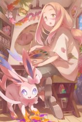 Rule 34 | 1girl, blonde hair, bright pupils, comfey, commentary request, creatures (company), easel, eyelashes, facepaint, from below, game freak, gen 1 pokemon, gen 2 pokemon, gen 6 pokemon, gen 7 pokemon, green eyes, holding, indoors, jigglypuff, long hair, mina (pokemon), nintendo, orange mikan, oversized clothes, oversized shirt, paint, paintbrush, pants, pokemon, pokemon (creature), pokemon sm, ribombee, shirt, shoes, short sleeves, sitting, stool, swinub, sylveon, table, torn clothes, torn pants, trial captain