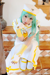 Rule 34 | 1girl, alice carroll, alice carroll (cosplay), aria (manga), asian, blue eyes, boots, color contacts, cosplay, fingerless gloves, gloves, green hair, hat, kipi-san, long hair, looking at viewer, mole, photo (medium), sailor collar, sitting, solo, undine, uniform