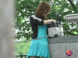 Rule 34 | 1boy, 1girl, animated, animated gif, asian, ass, censored, clothes lift, dress, dress lift, lowres, outdoors, panties, photo (medium), public indecency, red panties, restrained, underwear, wedgie