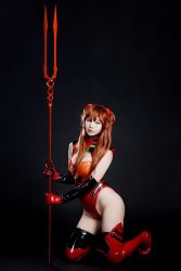 Rule 34 | 1girl, adapted costume, blue eyes, bodysuit, breasts, brown hair, cosplay, covered navel, hair ornament, hand in own hair, highleg, highleg leotard, highres, holding, holding weapon, interface headset, kneeling, lance, leotard, long hair, medium breasts, model request, neon genesis evangelion, photo (medium), plugsuit, polearm, rebuild of evangelion, red leotard, shiny clothes, simple background, skin tight, solo, souryuu asuka langley, souryuu asuka langley (cosplay), twintails, two side up, weapon