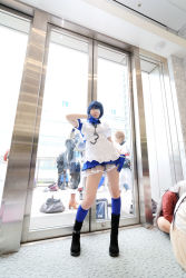 Rule 34 | 1girl, apron, asian, black footwear, blue eyes, blue gloves, blue hair, blue socks, boots, collar, color contacts, contrapposto, cosplay, cross, cuffs, eyepatch, full body, gloves, handcuffs, high heels, highres, ikkitousen, indoors, kneehighs, looking at viewer, maid, maid apron, namada, photo (medium), puffy short sleeves, puffy sleeves, ryomou shimei, ryomou shimei (cosplay), short sleeves, socks, solo focus, standing