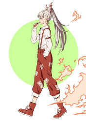 1girl candy fire food from_side fujiwara_no_mokou grey_hair hand_in_pocket highres inuno_rakugaki lollipop long_sleeves ofuda ofuda_on_clothes ofuda_on_head pants ponytail red_footwear red_pants shirt solo suspenders touhou two-tone_background walking white_shirt