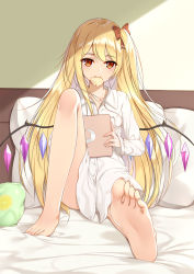 Rule 34 | 1girl, alternate hair length, alternate hairstyle, bare legs, barefoot, bed, blonde hair, bow, cable, clothes between thighs, commentary request, crescent, crystal, fang, flan (seeyouflan), flandre scarlet, foot focus, foreshortening, full body, hair bow, highres, holding, indoors, knee up, long hair, looking at viewer, mouth hold, naked shirt, no headwear, no pants, one side up, pillow, red bow, red eyes, shirt, sitting, smile, solo, tablet pc, thighs, touhou, very long hair, white shirt, wings
