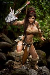 Rule 34 | 1girl, boots, bra, breasts, brown hair, chain, cleavage, collar, cosplay, fang, jessica nigri, jungle, league of legends, long hair, looking at viewer, nature, nidalee, outdoors, photo (medium), polearm, ponytail, skirt, spear, stone, tattoo, underwear, weapon