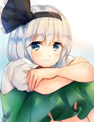 Rule 34 | 1girl, black bow, blue eyes, bow, closed mouth, commentary request, crossed arms, eyelashes, frown, green skirt, hair bow, konpaku youmu, looking at viewer, nagare, short sleeves, silver hair, sitting, skirt, solo, touhou
