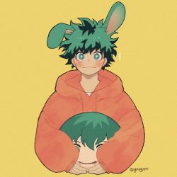Rule 34 | !, 1boy, animal ears, artist name, blush, boku no hero academia, bright pupils, character doll, closed mouth, commentary request, cropped torso, freckles, gaagyeo, green eyes, green hair, highres, holding, holding stuffed toy, hood, hood down, hoodie, korean commentary, long sleeves, looking at viewer, male focus, midoriya izuku, orange hoodie, rabbit ears, short hair, simple background, solo, stuffed toy, twitter username, upper body, white pupils, yellow background