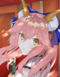 Rule 34 | 1girl, animal ear fluff, animal ears, blue bow, blurry, blurry background, blurry foreground, bow, commentary, day, detached collar, english commentary, eyelashes, fate/extra, fate (series), fox ears, fox girl, hair between eyes, hair bow, highres, lips, long hair, looking at viewer, looking back, minako larima, new year, outdoors, pink hair, portrait, sidelocks, solo, split ponytail, tamamo (fate), tamamo no mae (fate/extra), teeth, torii, yellow eyes