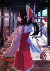Rule 34 | 1girl, architecture, autumn leaves, bare shoulders, black hair, blush, bow, brown eyes, closed mouth, cowboy shot, detached sleeves, east asian architecture, from behind, hair bow, hair tubes, hakurei reimu, holding broom, japanese clothes, leaf, long hair, long sleeves, looking at viewer, looking back, maple leaf, marusan, miko, ponytail, profile, red bow, red shirt, red skirt, ribbon-trimmed sleeves, ribbon trim, shirt, skirt, skirt set, sleeveless, sleeveless shirt, solo, touhou, wide sleeves