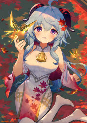 Rule 34 | 1girl, ahoge, ainy, alternate costume, autumn, autumn leaves, bare shoulders, bell, blue hair, blush, breasts, curled horns, detached sleeves, ganyu (genshin impact), genshin impact, gold trim, highres, horns, long hair, looking at viewer, medium breasts, neck bell, purple eyes, sidelocks, smile, solo