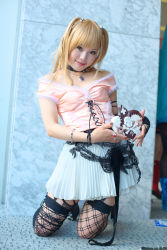Rule 34 | 1girl, amane misa, amane misa (cosplay), asian, bare shoulders, blonde hair, breasts, choker, color contacts, cosplay, cross, death note, dutch angle, fingerless gloves, garter straps, gloves, hair ornament, highres, indoors, jewelry, kipi-san, kneeling, long hair, looking at viewer, miniskirt, mole, pendant, photo (medium), ring, single glove, skirt, skull and crossbones, skull hair ornament, skull ring, small breasts, smile, solo, thighhighs, two side up, zettai ryouiki
