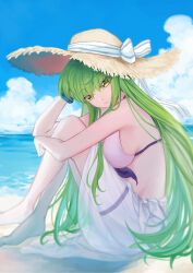 1girl absurdres bad_feet beach bikini blue_sky bow bracelet breasts c.c. closed_mouth cloud code_geass day from_side green_hair hat hat_bow highres jewelry knees_up long_hair looking_at_viewer medium_breasts ocean okuseric outdoors sarong see-through_clothes see-through_sarong sitting sky smile solo straw_hat sun_hat swimsuit thigh_strap very_long_hair water white_bikini yellow_eyes