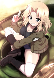 Rule 34 | 10s, 1girl, black shirt, blonde hair, blouse, blue eyes, boots, breasts, cleavage, day, denim, denim shorts, from above, girls und panzer, grin, hair intakes, highres, jacket, kay (girls und panzer), large breasts, long hair, looking at viewer, nakahira guy, outdoors, shirt, short shorts, shorts, sitting, smile, star (symbol), tank top, thighhighs, v-shaped eyebrows, white thighhighs