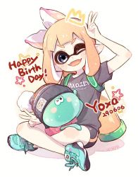Rule 34 | 1girl, artist name, bike shorts, black hat, black shirt, black shorts, blue eyes, blunt bangs, bobblehat, clothes writing, colored tongue, commentary request, cross-laced footwear, dated, english text, fangs, green footwear, happy birthday, hat, indian style, ink tank (splatoon), inkling, inkling (language), inkling girl, inkling player character, long hair, looking at viewer, nintendo, one eye closed, open mouth, orange eyes, orange tongue, pointy ears, sen squid, shirt, shoes, short sleeves, shorts, signature, single vertical stripe, sitting, smile, sneakers, solo, splatoon (series), splatoon 1, star (symbol), t-shirt, tentacle hair, v