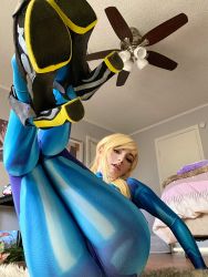 Rule 34 | 1girl, ass, ass focus, bedroom, blonde hair, bodysuit, breasts, cameltoe, cosplay, highres, huge ass, legs up, metroid, nintendo, omgcosplay, photo (medium), ponytail, real life, samus aran, samus aran (cosplay), shiny clothes, skin tight, solo, thick thighs, thighs, wide hips, zero suit