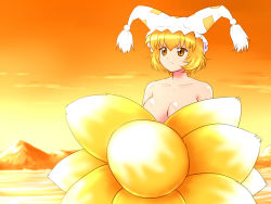 Rule 34 | 1girl, blonde hair, breasts, cleavage, collarbone, covering privates, covering breasts, female focus, fox tail, hat, hat with ears, large breasts, mountain, multiple tails, nude, red sky, shirosato, short hair, sky, solo, sunset, tail, touhou, yakumo ran, yellow eyes