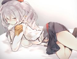 Rule 34 | 10s, 1girl, blue eyes, blush, breasts, epaulettes, from side, fuu fuu, gloves, hat, kantai collection, kashima (kancolle), long hair, looking at viewer, lying, on side, on stomach, sideboob, silver hair, skirt, smile, solo, twintails, uniform, wavy hair