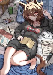 Rule 34 | 1girl, agnes tachyon (umamusume), ahoge, alternate costume, animal ears, barefoot, bed, book, brown eyes, cellphone, closed mouth, clothes writing, collarbone, commentary request, digital media player, drawstring, earrings, from above, hair between eyes, hand rest, hand up, head on pillow, head tilt, highres, hood, hood down, hoodie, horse ears, horse girl, horse tail, huge ahoge, indoors, jewelry, knee up, light smile, long bangs, long sleeves, looking at viewer, lying, medium hair, no pants, notebook, okitsugu, on back, on bed, open book, phone, photo (object), pillow, red eyes, smartphone, solo, tail, tissue, tissue box, toes, umamusume