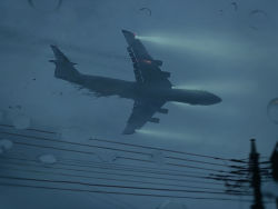 Rule 34 | absurdres, aircraft, airplane, blue theme, fog, glowing, highres, horror (theme), kakesoba, no humans, original, overcast, power lines, puddle, rain, sky, vehicle focus, water