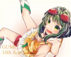 Rule 34 | 1girl, anniversary, arms up, bare shoulders, blush, boots, character name, commentary, dress, feet out of frame, foreshortening, frilled dress, frilled legwear, frills, from above, goggles, goggles on head, green eyes, green hair, green nails, gumi, highres, index finger raised, knee boots, light blush, looking at viewer, manya sora, nail polish, open mouth, orange dress, red goggles, sleeveless, sleeveless dress, smile, solo, thigh strap, vocaloid