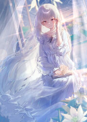 1girl absurdres alternate_costume blue_archive blurry blush book closed_mouth commentary_request crossed_bangs depth_of_field dress eshineko grey_hair hair_between_eyes halo highres holding holding_book indoors long_hair looking_at_viewer loungewear open_book red_eyes sakurako_(blue_archive) smile solo sunset white_dress winged_halo yellow_halo