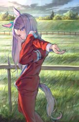 Rule 34 | 1girl, absurdres, animal ears, day, feet out of frame, fence, from side, grass, grin, head tilt, highres, horse ears, horse girl, horse tail, huge filesize, long hair, looking at viewer, mejiro mcqueen (umamusume), outdoors, purple eyes, purple hair, red track suit, sky, smile, solo, standing, stretching, sun, tail, tentsuu (tentwo), umamusume