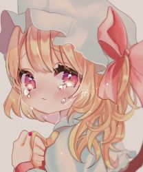 Rule 34 | 1girl, :s, ascot, blonde hair, blush, bow, crying, crying with eyes open, fang, flandre scarlet, from side, grey background, hair bow, hat, looking at viewer, mob cap, moni monico, nail polish, one side up, portrait, red bow, red nails, short hair, signature, simple background, skin fang, solo, tearing up, tears, touhou, upper body, wrist cuffs, yellow ascot