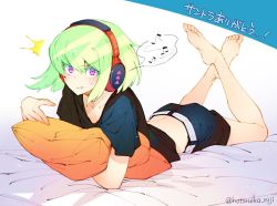 Rule 34 | 1boy, barefoot, bed, earrings, green hair, headphones, hotaruika niji, jewelry, lio fotia, looking at viewer, lying, male focus, hugging object, on stomach, open mouth, pillow, pillow hug, promare, purple eyes, short hair, shorts, signature, solo, surprised