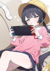 +_+ 1girl absurdres black_hair blue_archive blue_skirt bucket_hat commentary couch food_in_mouth grey_eyes hair_bobbles hair_ornament halo handheld_game_console hat highres hiroikara_(smhong04) holding holding_handheld_game_console kindergarten_uniform kisaki_(blue_archive) kisaki_(kindergarten_uniform)_(blue_archive) low_twintails miniskirt on_couch out_of_character pink_shirt pleated_skirt school_hat shirt skirt socks solo sparkling_eyes twintails unworn_socks white_socks yellow_hat