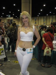 Rule 34 | 1girl, absurdres, belt, blonde hair, bodysuit, breasts, cape, cleavage, cleavage cutout, clothing cutout, cosplay, emma frost, gloves, highres, midriff, photo (medium)