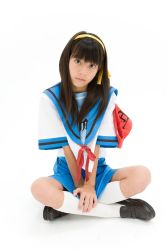 Rule 34 | 1girl, ai-chan (idol), armband, asian, brown hair, cosplay, female focus, highres, looking at viewer, photo (medium), school uniform, simple background, skirt, solo, suzumiya haruhi, suzumiya haruhi (cosplay), white background