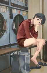 Rule 34 | 10s, 1girl, androgynous, barefoot, bench, black hair, brown shorts, artistic error, grey eyes, hand on own cheek, hand on own face, head rest, indoors, kantai collection, laundry, looking at viewer, makio (makiomeigenbot), mogami (kancolle), red shirt, sandals, unworn sandals, school uniform, shirt, short hair, shorts, sitting, slippers, smile, solo, washing machine