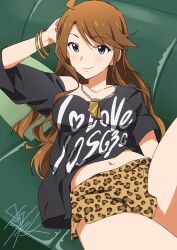 Rule 34 | 1girl, ahoge, animal print, black shirt, blue eyes, breasts, brown hair, collarbone, couch, cushion, hand up, head rest, idolmaster, idolmaster million live!, jewelry, leg up, leopard print, long hair, lying, navel, necklace, on back, on couch, print shirt, shirt, shorts, signature, single bare shoulder, smile, solo, swept bangs, taku1122, thighs, tokoro megumi, wristband