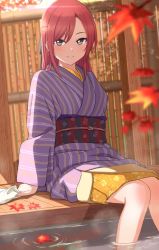 Rule 34 | 1girl, blurry, blurry foreground, blush, character request, commission, copyright request, feet out of frame, grey eyes, half updo, japanese clothes, kimono, leaf, long hair, long sleeves, looking at viewer, maple leaf, obi, onsen, outdoors, purple kimono, red hair, sash, shibasaki shouji, sitting, skeb commission, smile, soaking feet, towel